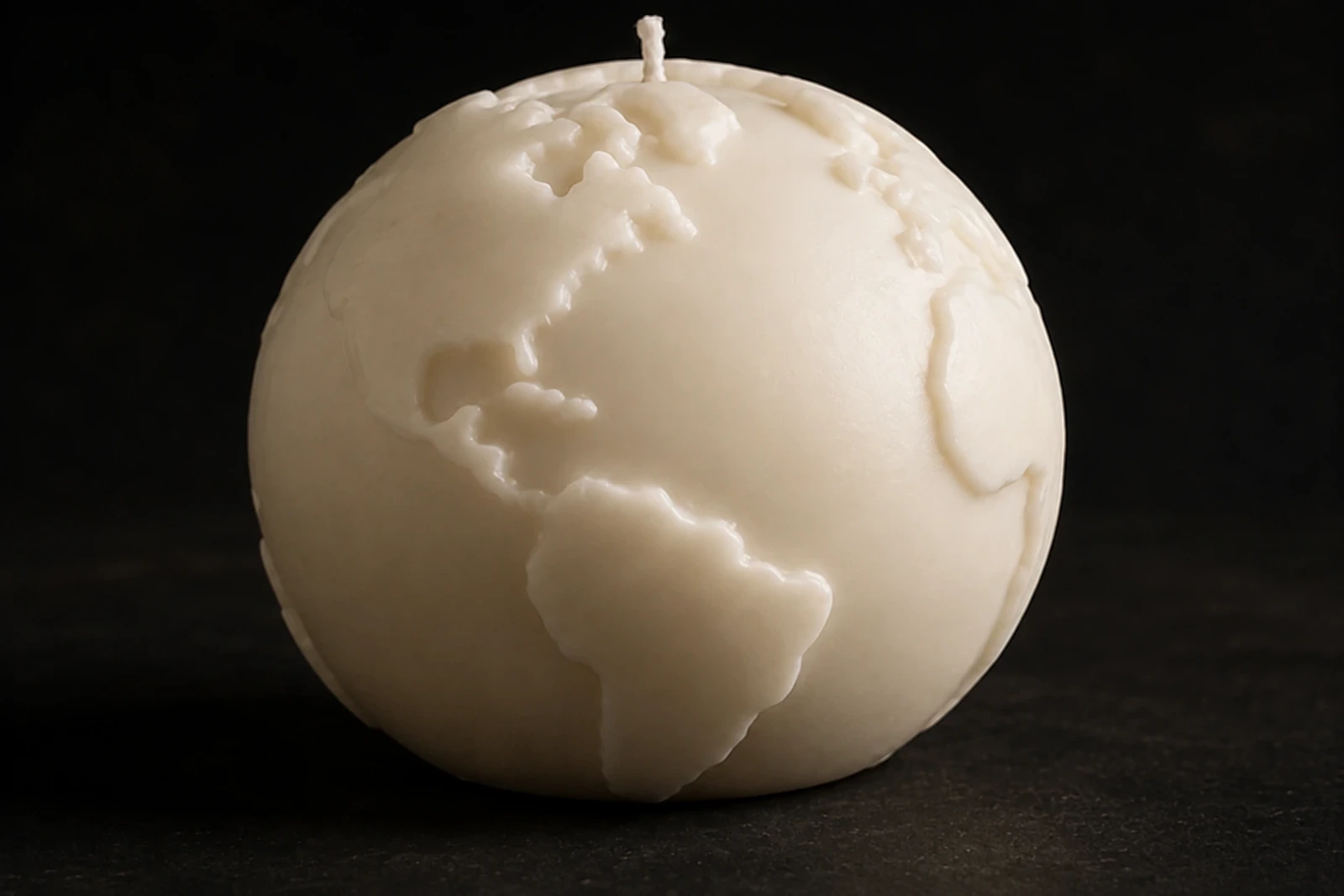 Origine, versione avorio della candela globo terrestre